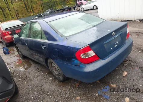 2002 Toyota Camry Le z USA, uszkodzony, nr VIN 4T1BE32K92U578261